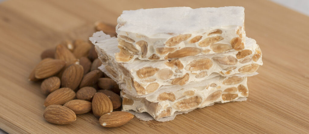 "Turrón," a nougat confection made from honey, sugar, and toasted almonds.